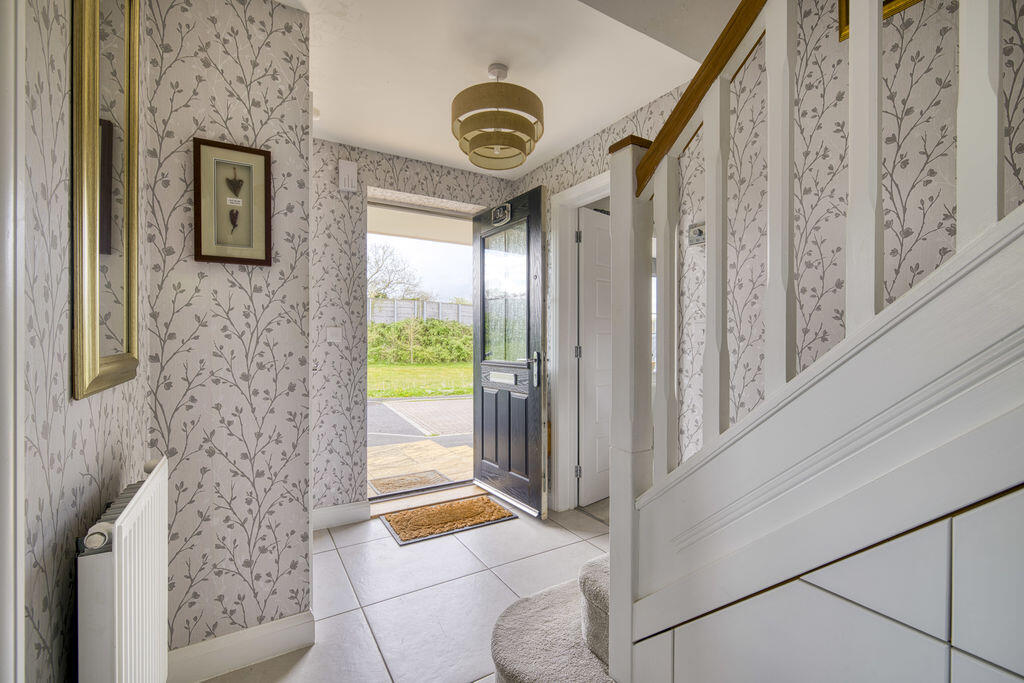Immaculately presented 4 double bedroom home photo 5