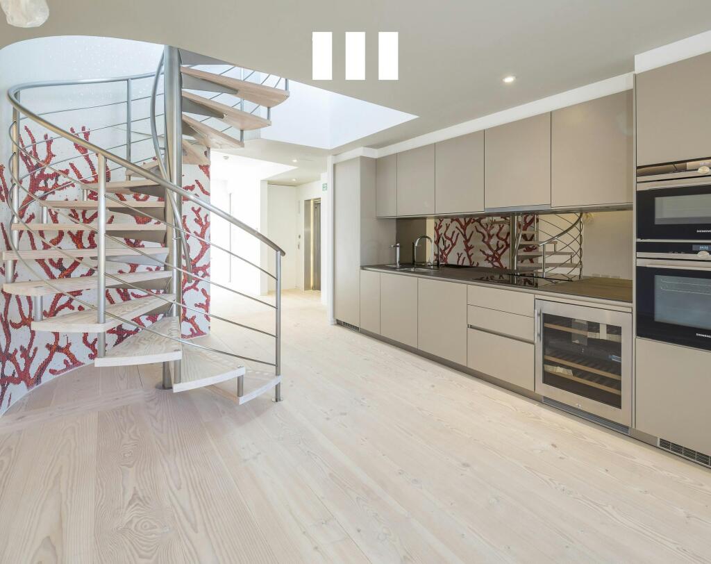 8 City Road Sleek Kitchen With Spiral Staircase And Modern Design Accents.jpg