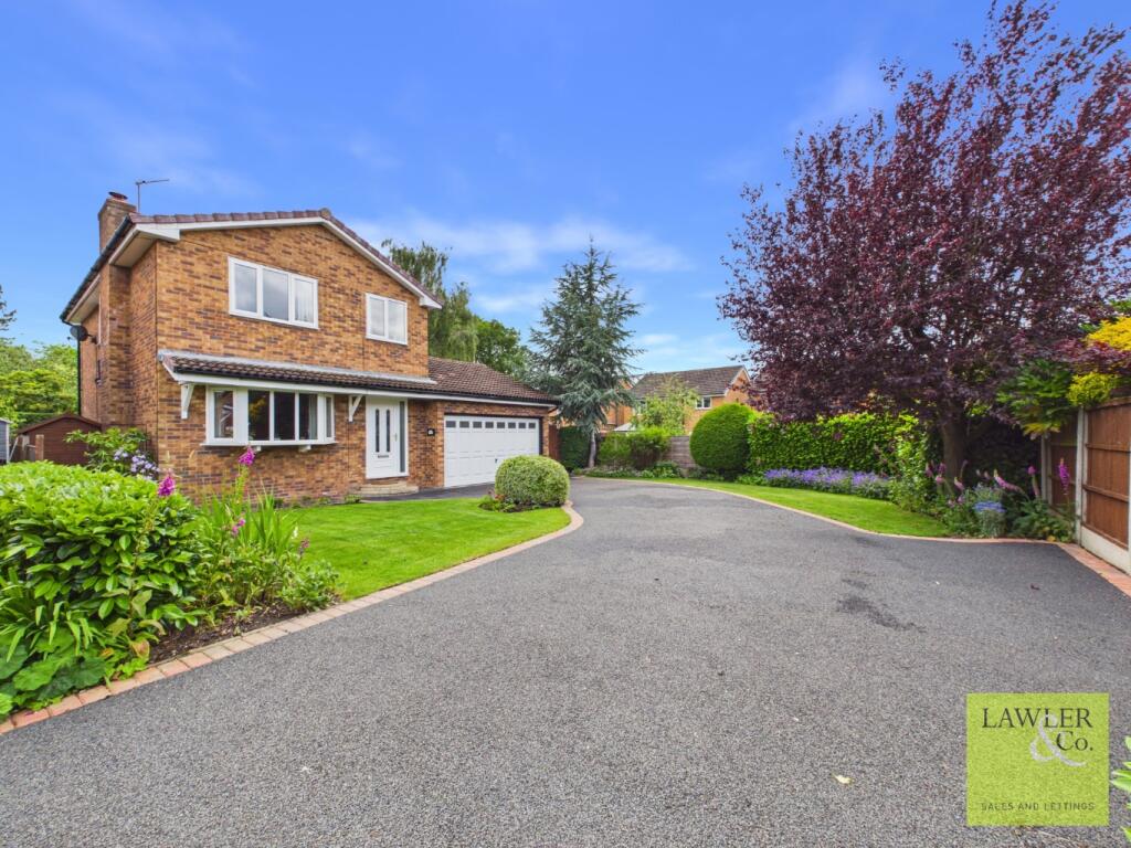 Main image of property: Lambourn Close, Poynton, Stockport, Cheshire, SK12 1UG