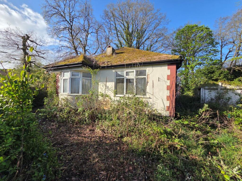 Main image of property: 23 Woodland Way, Croydon, Surrey, CR0 7UB