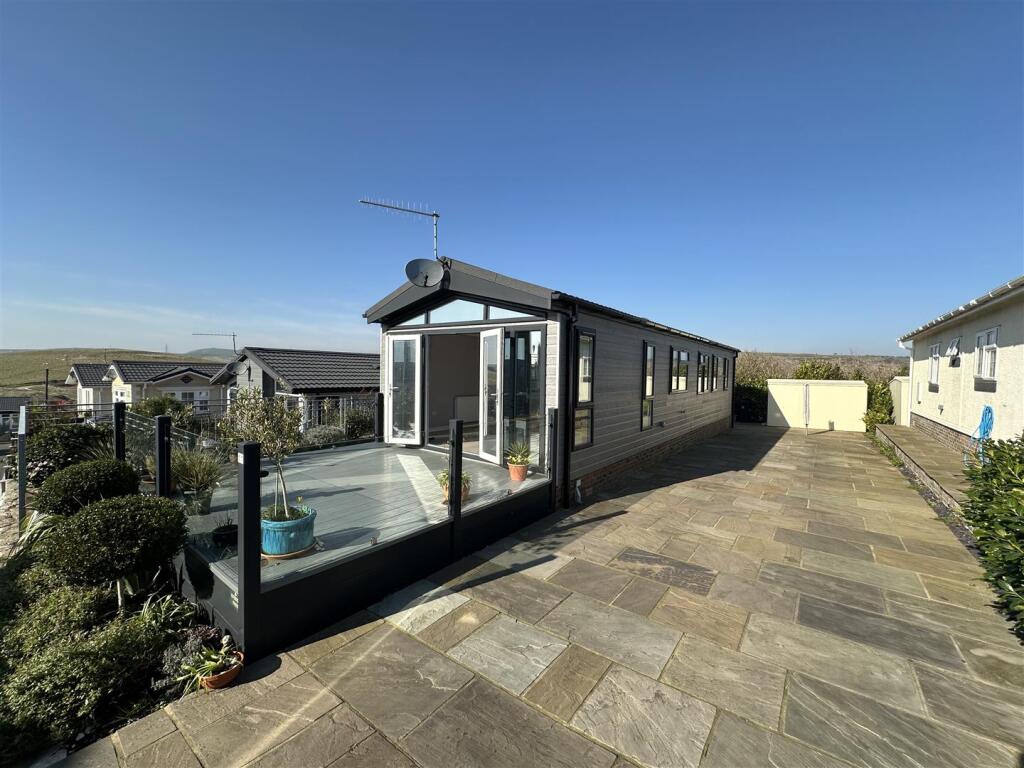 Main image of property: WHITE HORSE PARK HOMES, OSMINGTON HILL, WEYMOUTH, DORSET