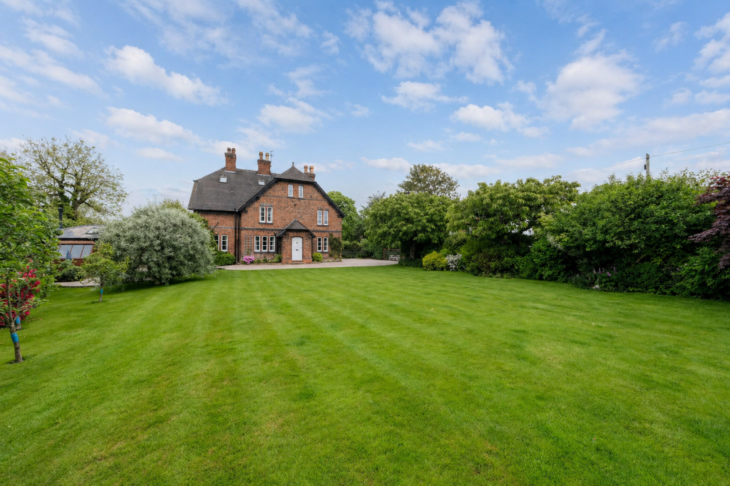 Main image of property: Ashville, Mill Lane, Lymm WA13 9SQ