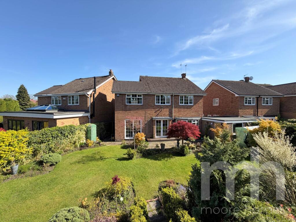Main image of property: RAVENSWOOD DRIVE, Cheadle Hulme SK8 7DZ