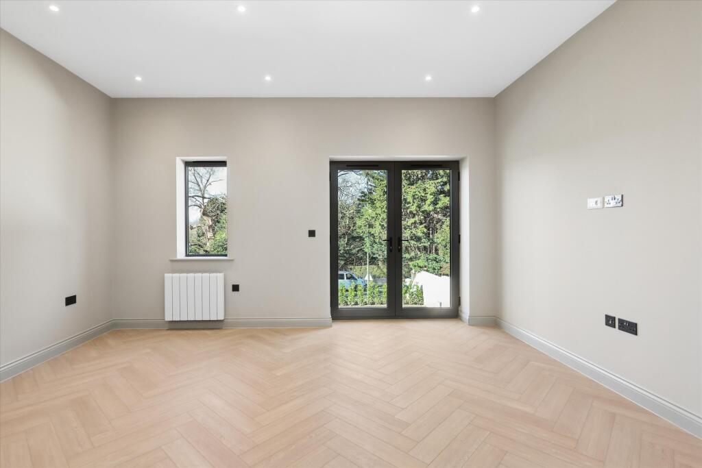 Main image of property: 1 Copsem Lane, Esher, Surrey KT10