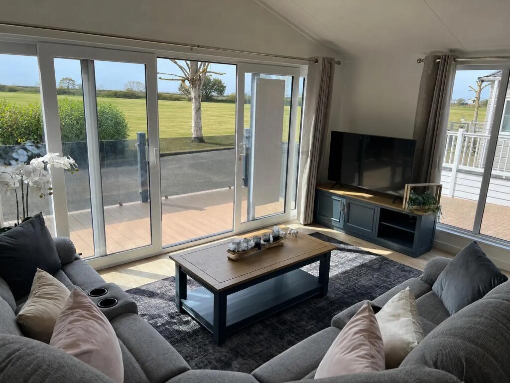 2022 Eco Custom Homes The Shipley Lodge, West Mersea Coastal Holiday Park, Seaview Avenue, Colchester, Essex, CO5 8DA photo 2