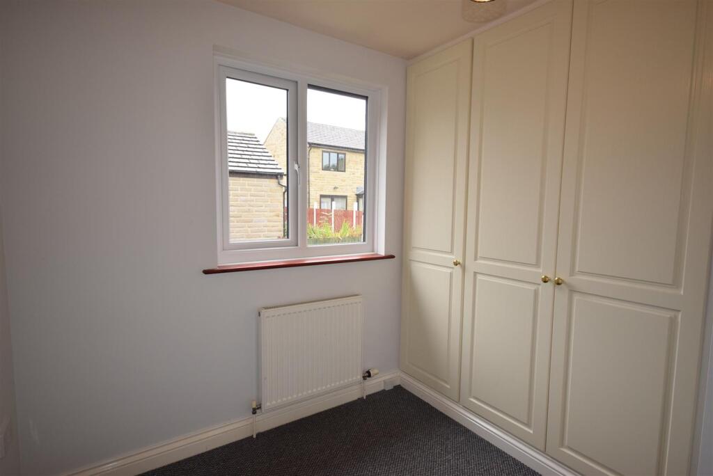 Main image of property: Thornfield Close, Lockwood, HD4 5HW