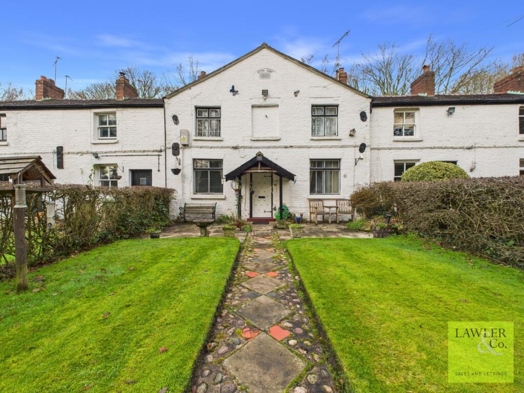 Main image of property: Worth Clough, Middlewood Road, Poynton, Stockport, Cheshire, SK12 1SH