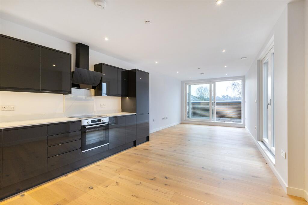 Main image of property: Churchfield Road, Weybridge, Surrey, KT13