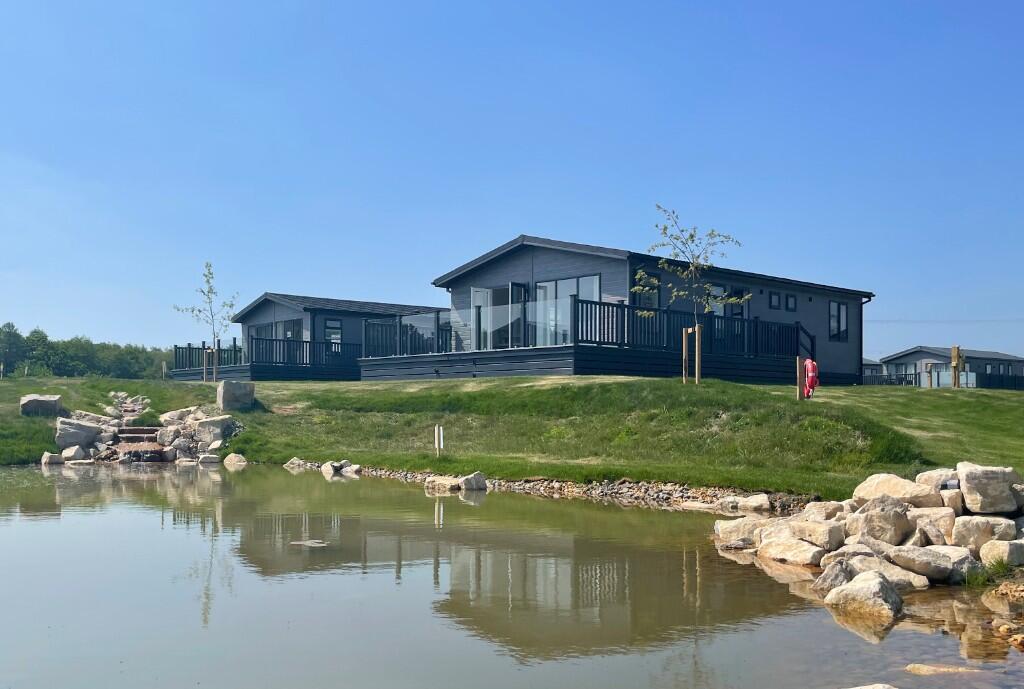 Main image of property: Green Hill Farm Holiday Village, New Road, SP5