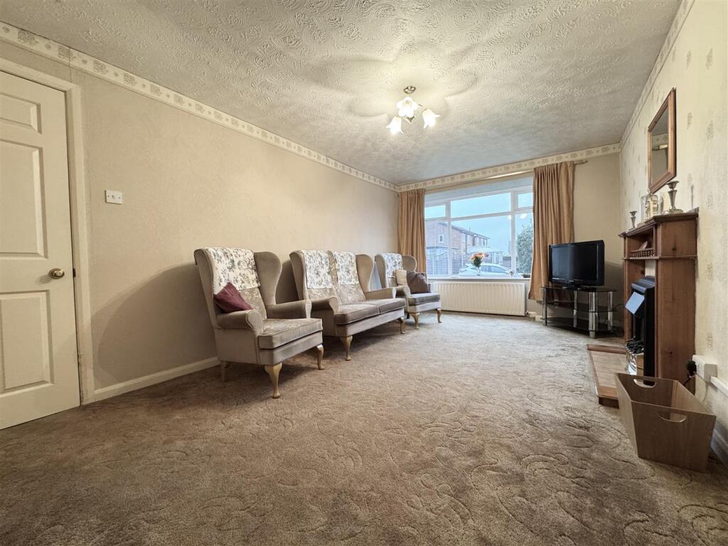 Main image of property: Woodlands Drive, Skelmanthorpe, Huddersfield HD8 9DB
