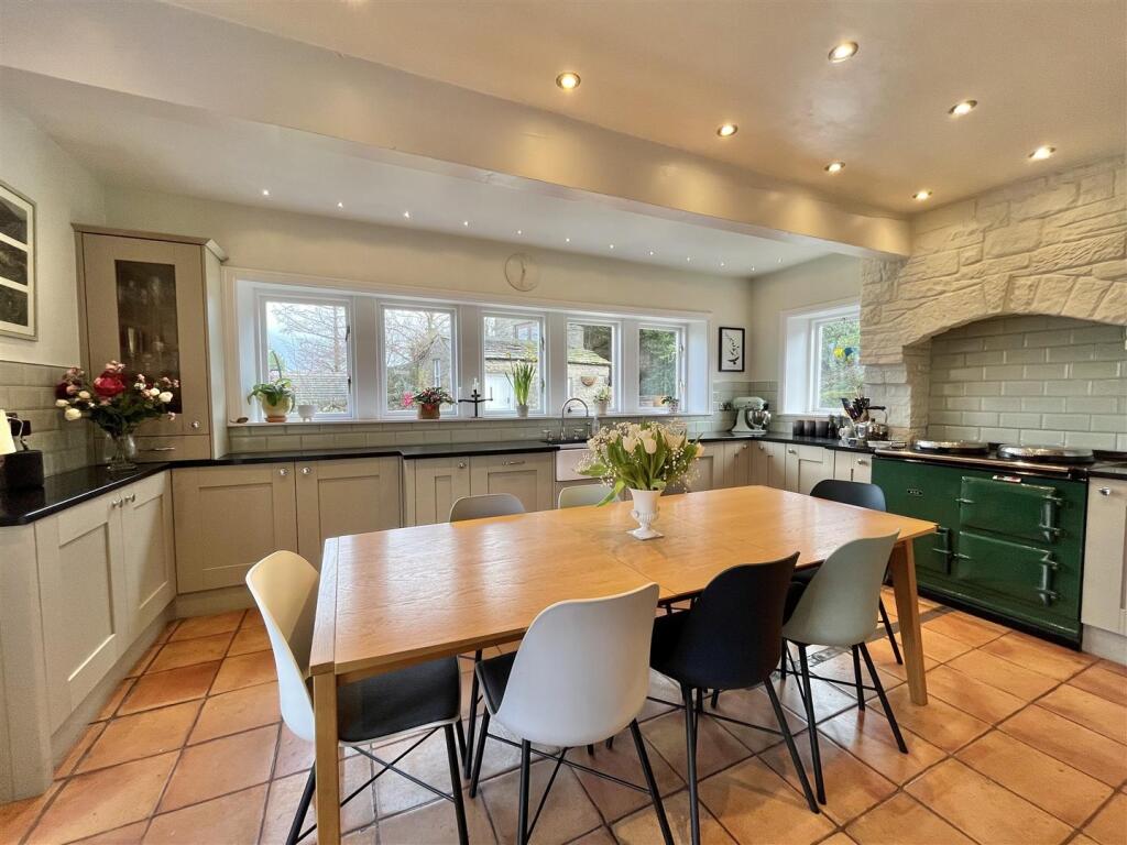 Bespoke farmhouse kitchen with AGA and granite tops
