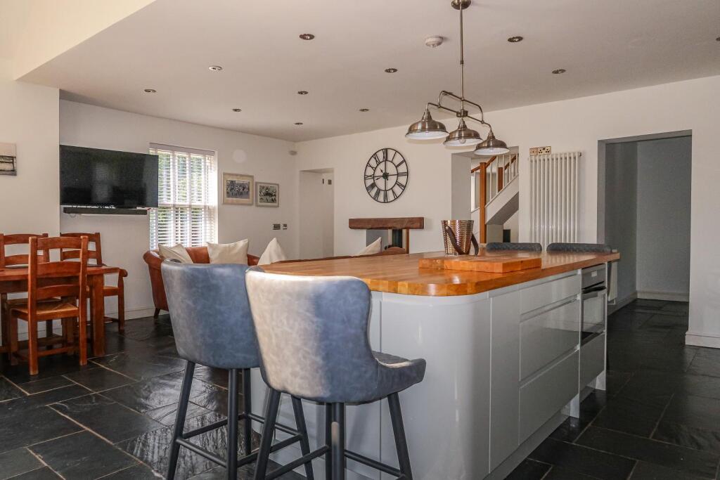 House in Coity - More
