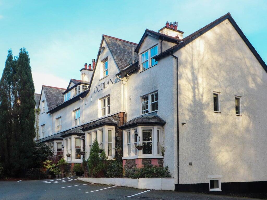 Main image of property: Woodlands Windermere, New Road, Windermere, LA23 2EE