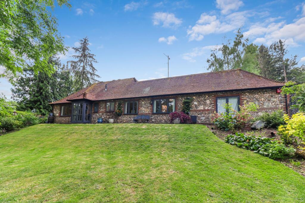 Main image of property: Roundwood Rucklers Lane, Kings Langley, WD4