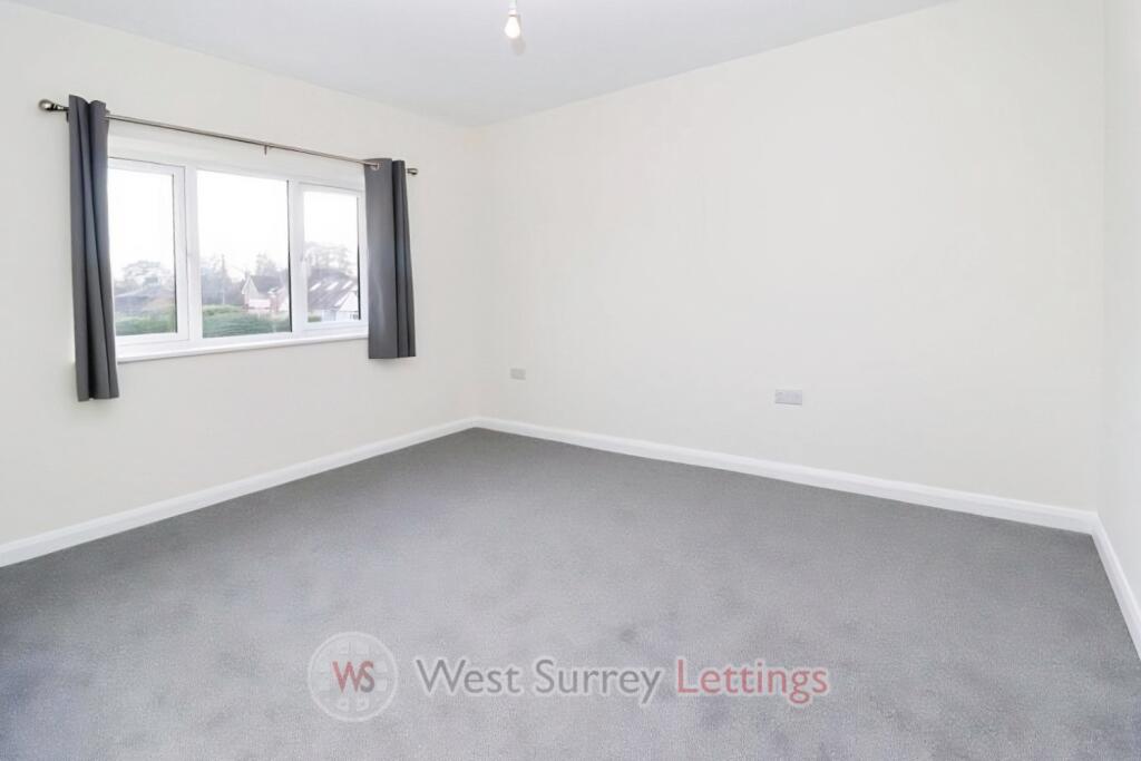 Main image of property: Woodham Lane, New Haw, KT15 3NR