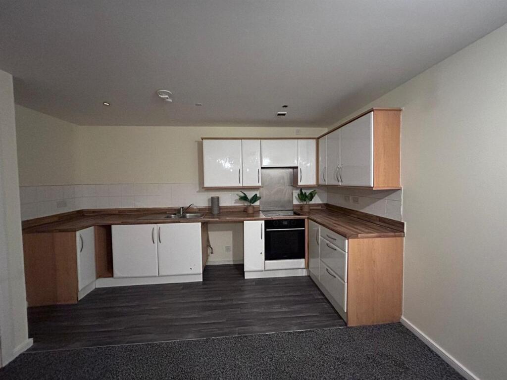 Main image of property: Hollin Bank Court, Blackburn, BB2 4GY