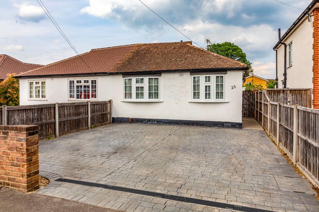 Main image of property: Pinewood Grove, New Haw, Surrey, KT15