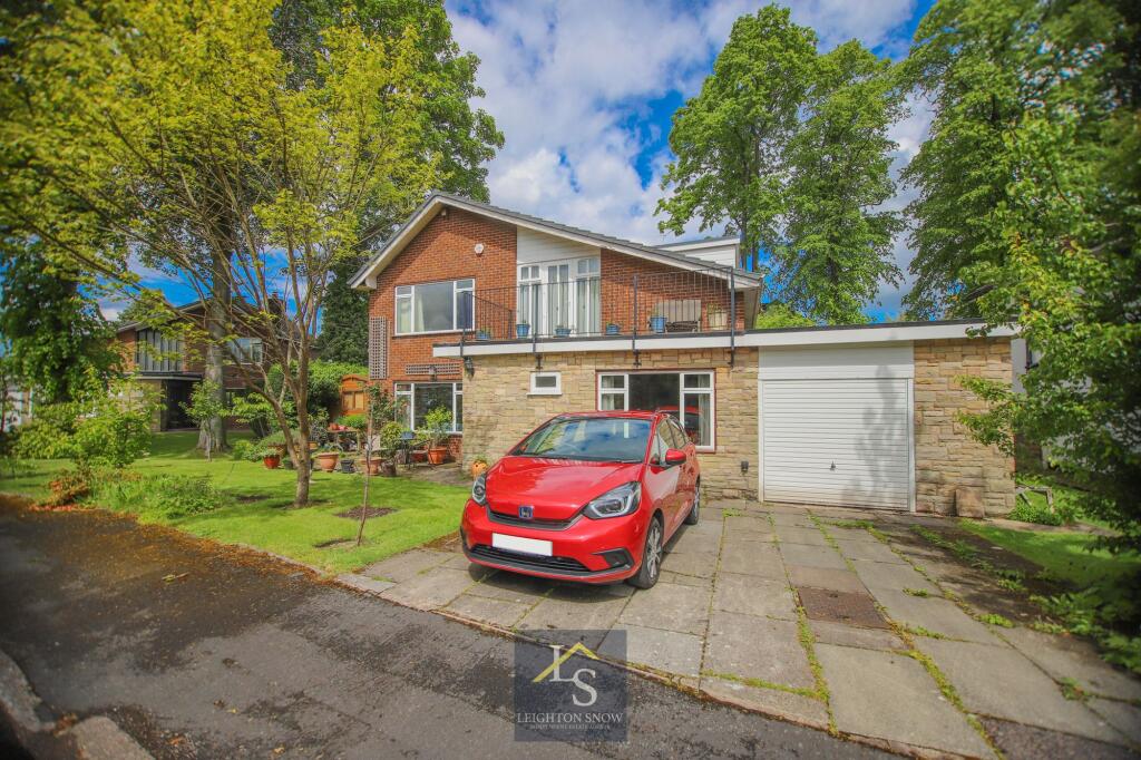 Main image of property: Moss Bank, Bramhall, SK7