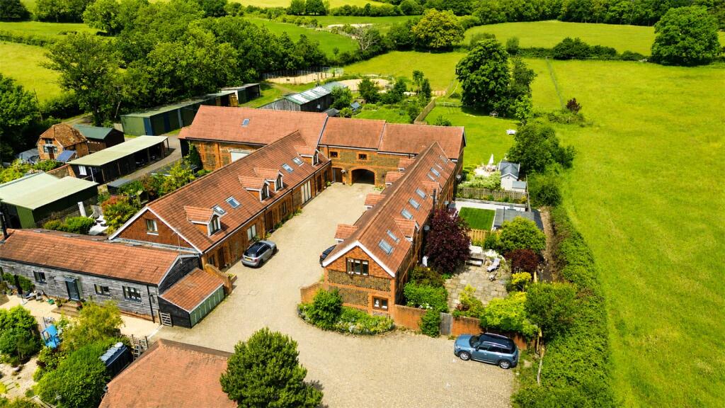 Main image of property: Manor Farm Mews, Dockenfield, Farnham, Surrey, GU10