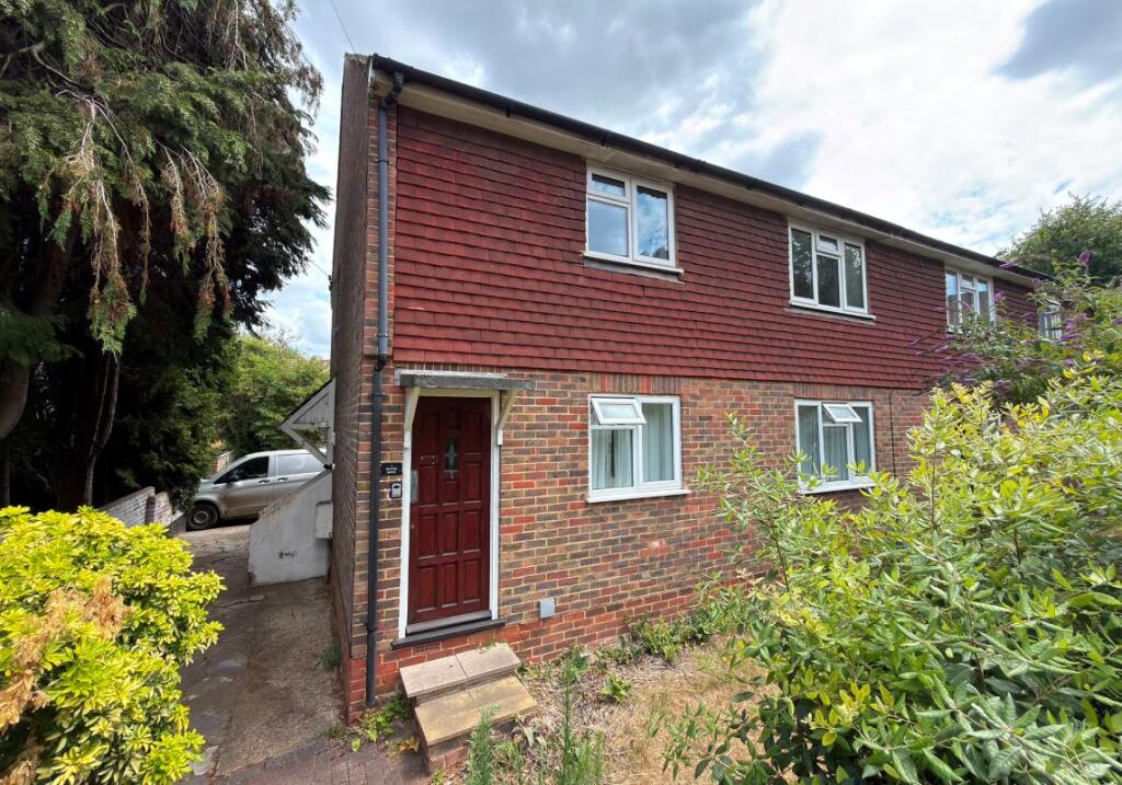 Main image of property: 1 Hunter House, Hunter Road, Guildford, Surrey, GU1 3LQ
