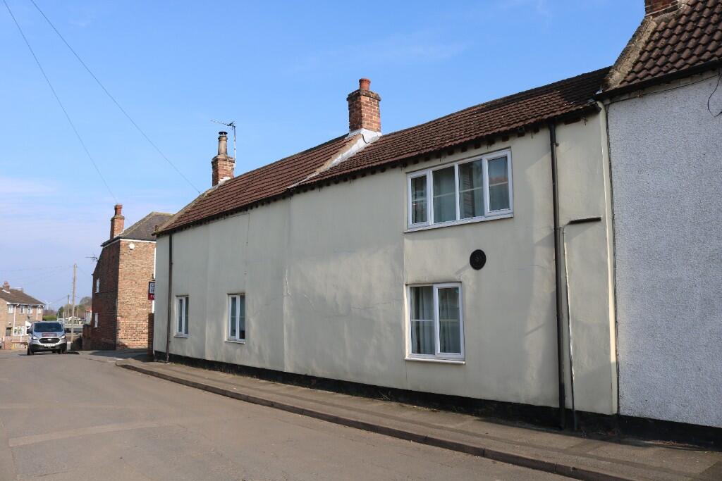 Main image of property: Wynlande Cottage, 17 Cross Slack, Crowle, DN17 4LY
