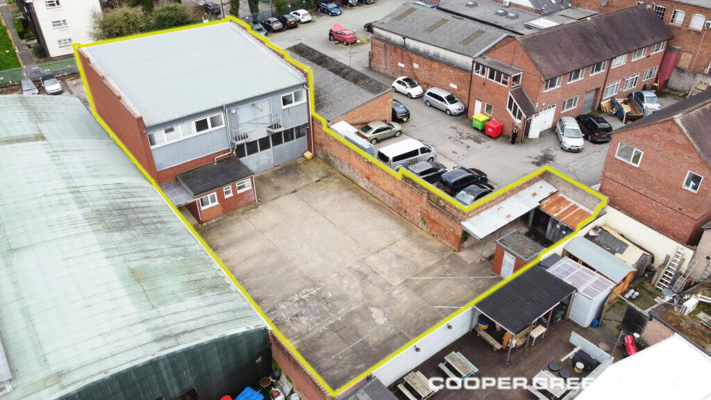 Silkmoor Drone Rear Elevation and Parking 4 Green Line.jpg