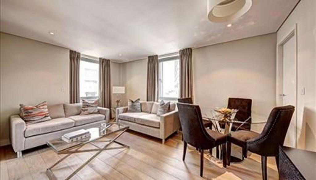 Main image of property: STUNNING INTERIOR DESIGNED APARTMENT