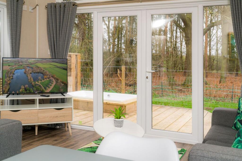 Main image of property: 6 Woodlakes Park, Downham Road, King's Lynn, Norfolk, PE34 3PX