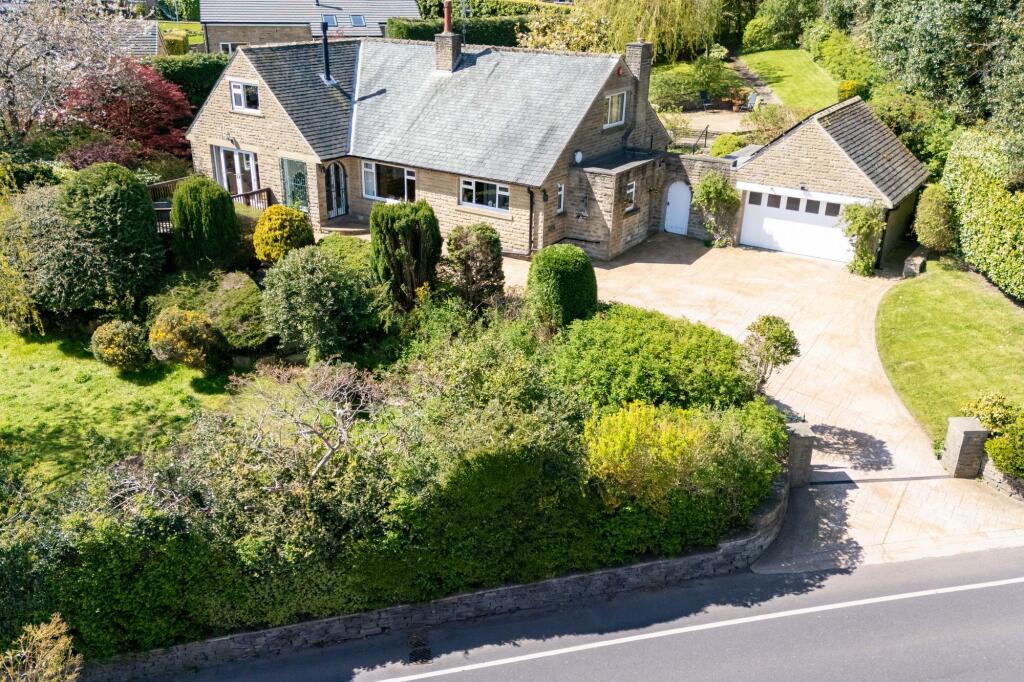 Main image of property: Newholme, New Road, Holmfirth, HD9