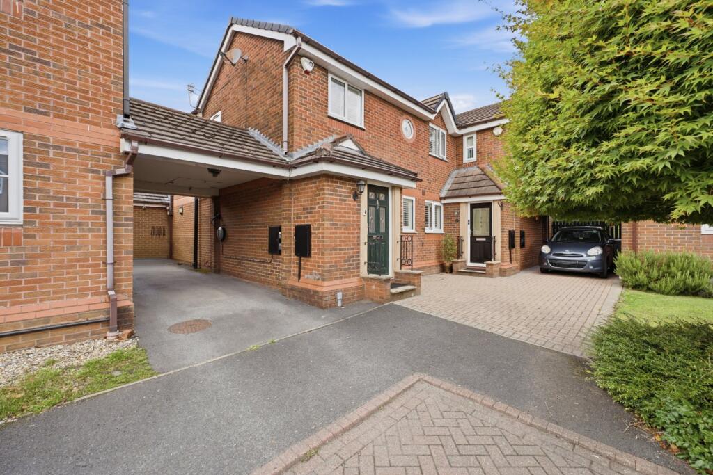 Main image of property: Holcombe Close, Altrincham, Greater Manchester, WA14