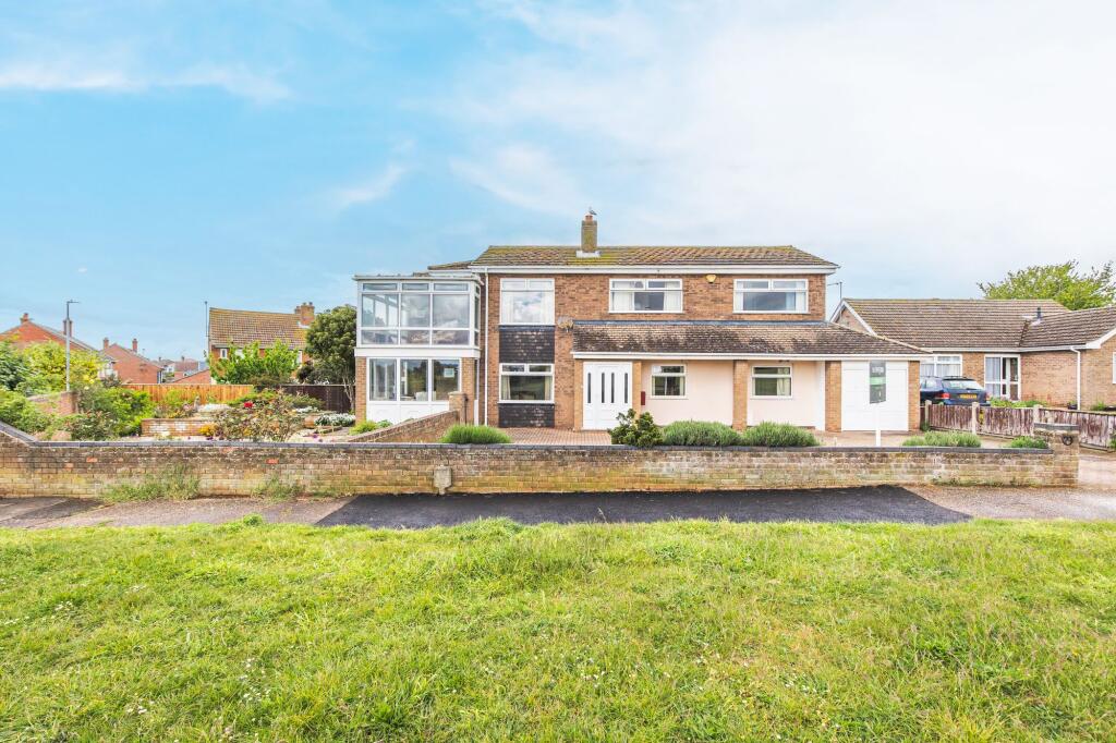 Main image of property: Detached Coastal Home in Hunstanton