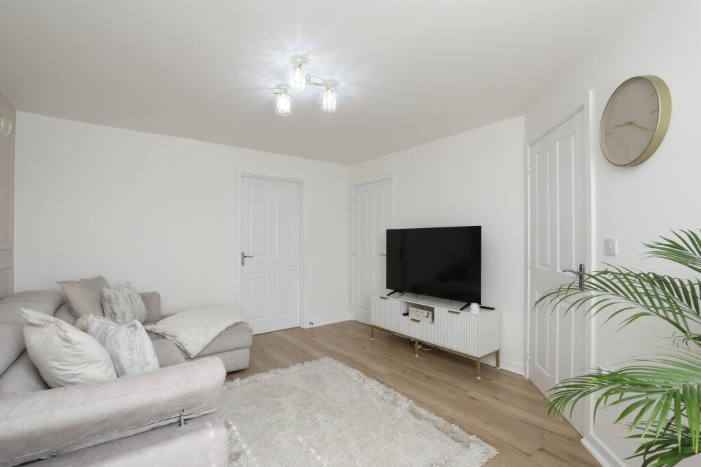 House in Coity - More