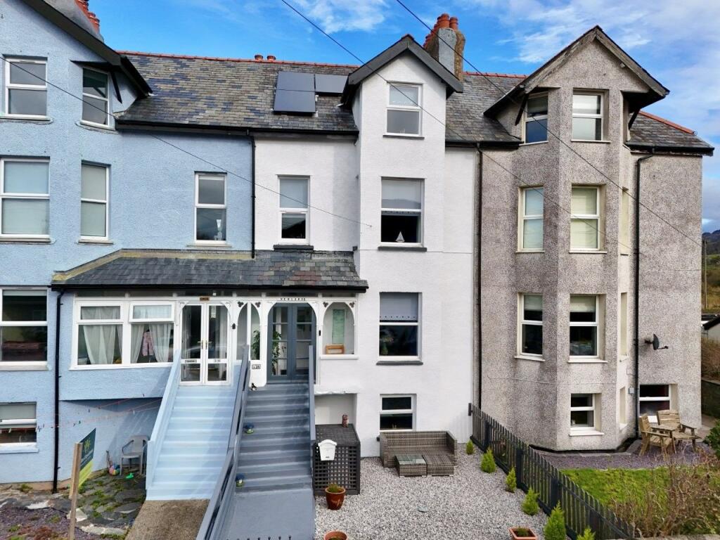 Main image of property: Newlands, 36 Belgrave Road, Fairbourne, LL38 2AZ
