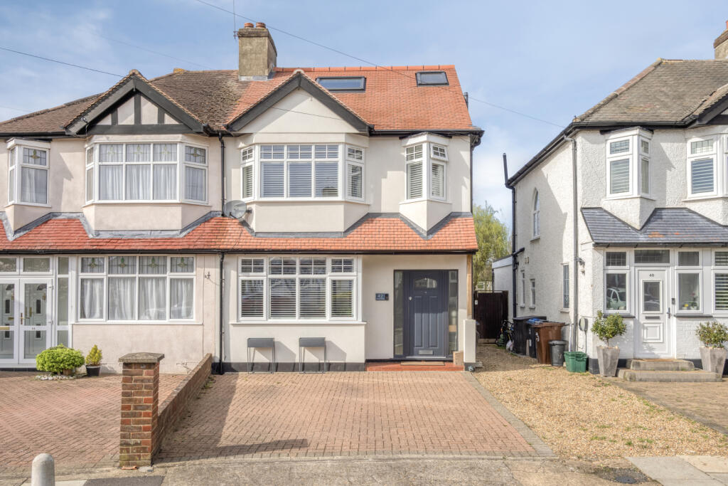 Main image of property: Carlingford Road, Morden, SM4