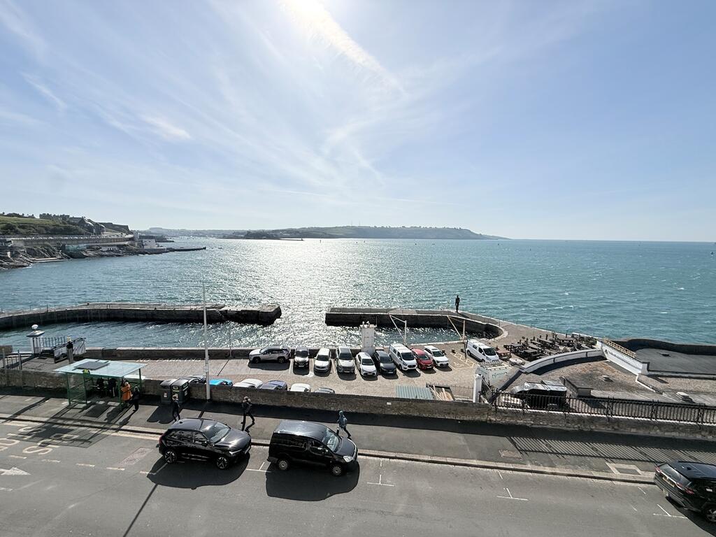 Main image of property: Top Floor Waterfront Apartment with Breathtaking Sea Views