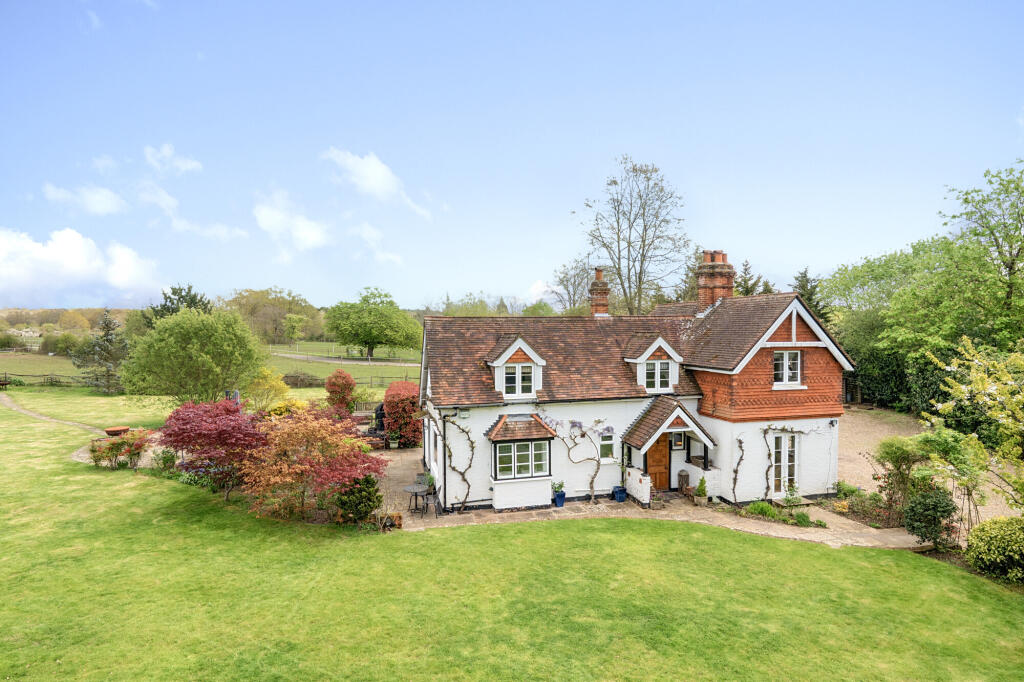 Main image of property: Woodlands Lane, Cobham, KT11