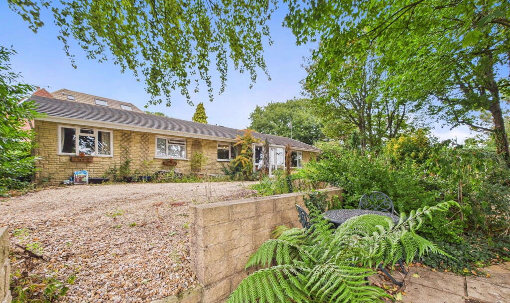 Main image of property: Iona, West Hill, High Salvington BN13 3BZ