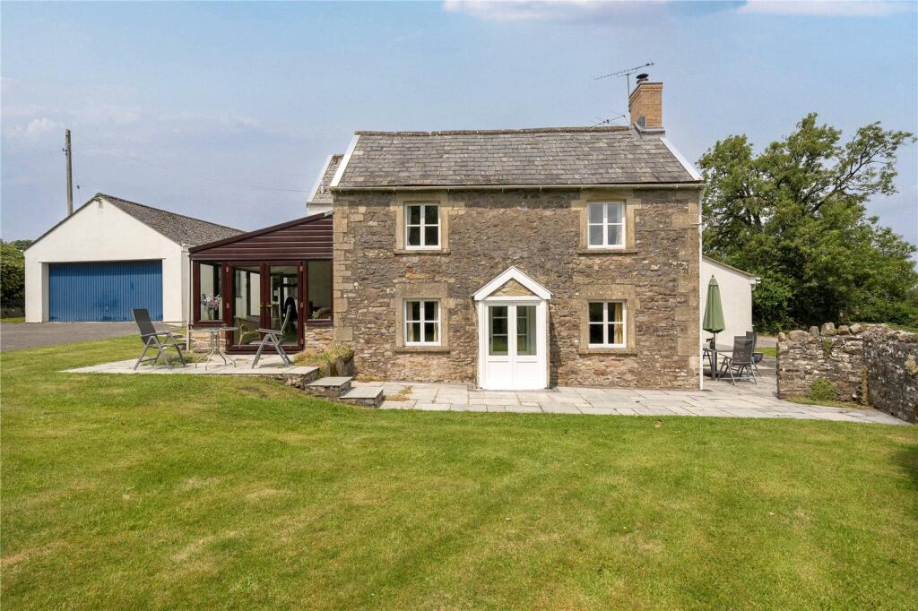 Main image of property: Four bedroom house with land situated edge of village