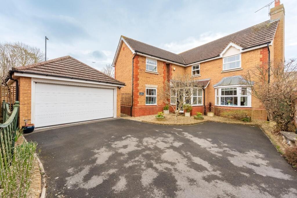 Main image of property: Extended residence situated within executive Yatton cul de sac