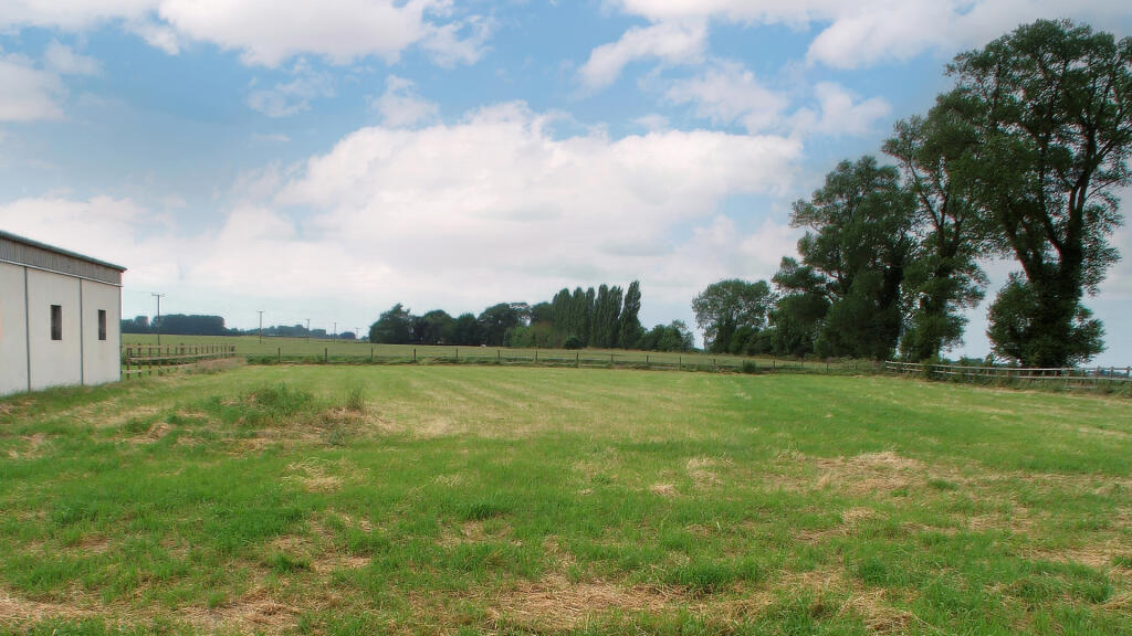 1.12 acres of flat land with defined boundaries.