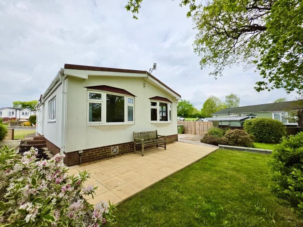 Main image of property: Woodlands Park, Tedburn St Mary, Exeter EX6 6AE