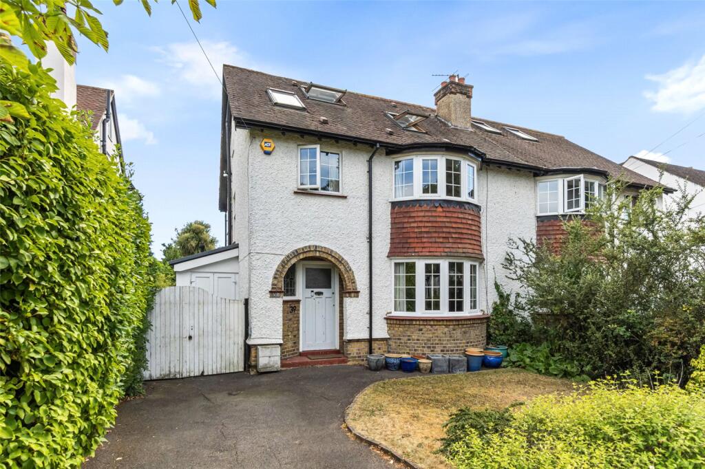 Main image of property: Courtlands Avenue, Hampton, TW12