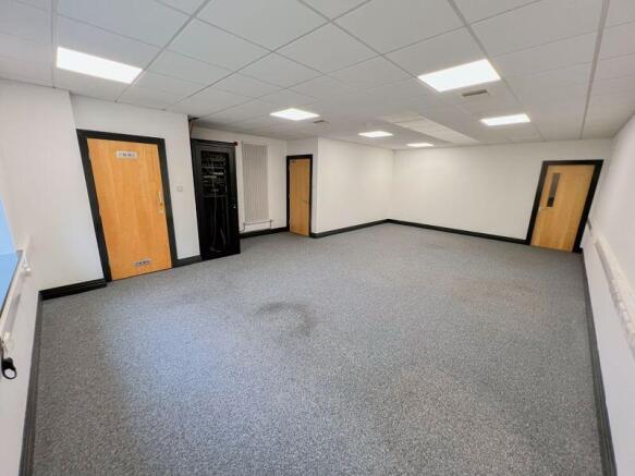 First Floor Office with Storage Room