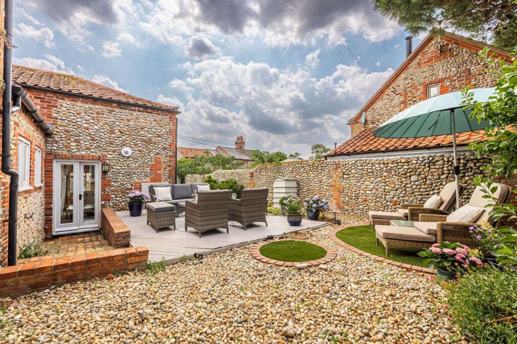 Main image of property: Beautifully Renovated Brick and Flint Cottage in Langham