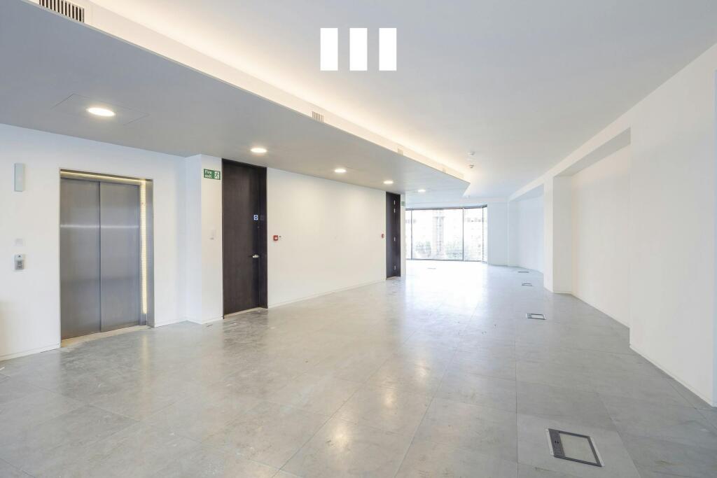 8 City Road Spacious Modern Corridor With Elevator Access.jpg
