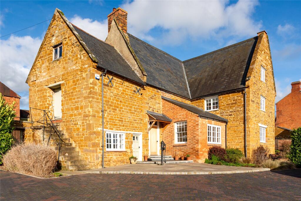 Main image of property: High Street, Flore, Northampton, Northamptonshire, NN7