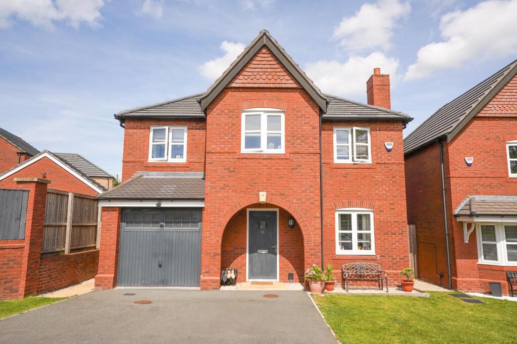 Main image of property: Iron Drive, Standish, Wigan, WN6 0UZ