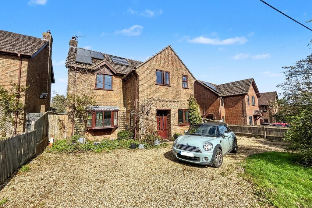 Main image of property: Woodlands