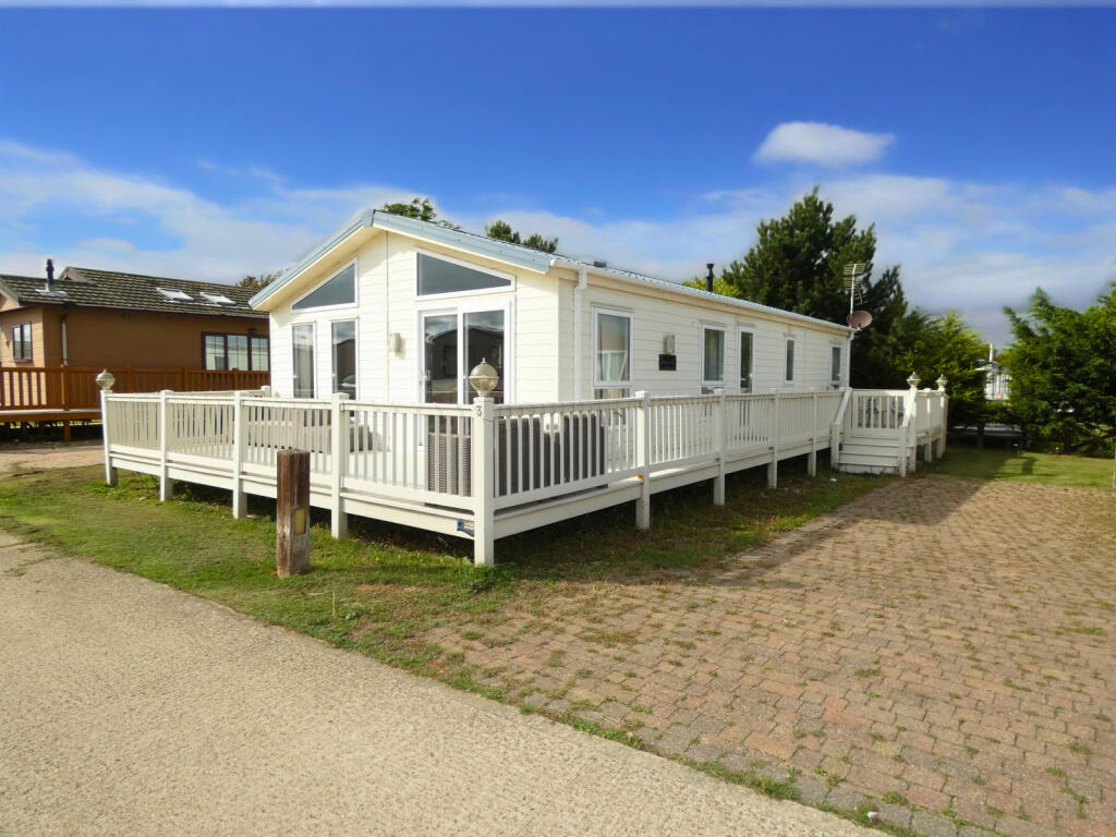 Main image of property: Coopers Beach Caravan Park, CO5