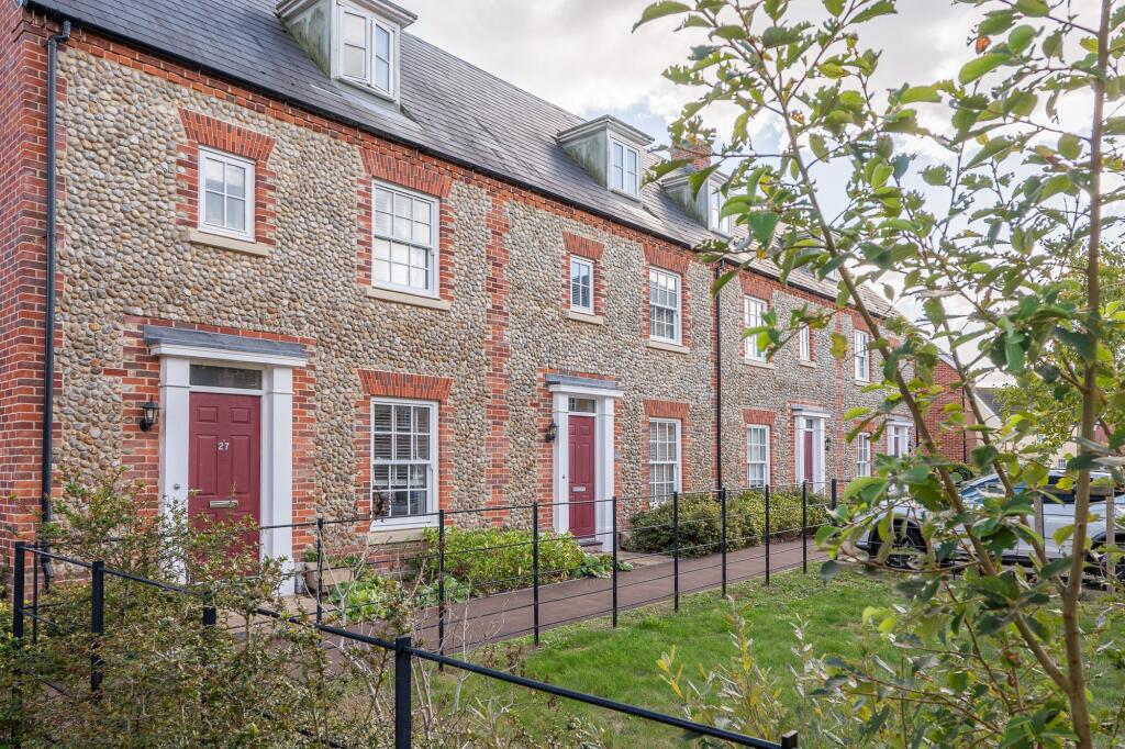 Main image of property: Spacious Three Bedroom Brick and Flint Townhouse in Holt